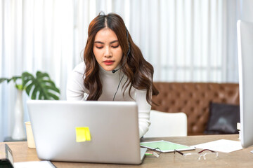 Fototapeta premium Happy asian woman call center smiling business operator customer work help support, contact us, address, operator, customer, support, phone agen, live chat, internet wifi, customer support hotline