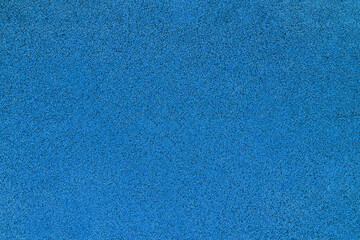 Grainy blue texture made of rubber tiles