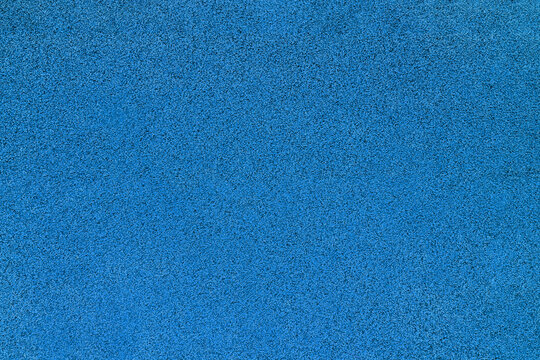 Grainy blue texture made of rubber tiles