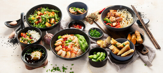 Asian food background with various ingredients on white background , top view.