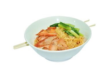 dry Chinese egg noodles topping slice roasted red pork on bowl with chopsticks