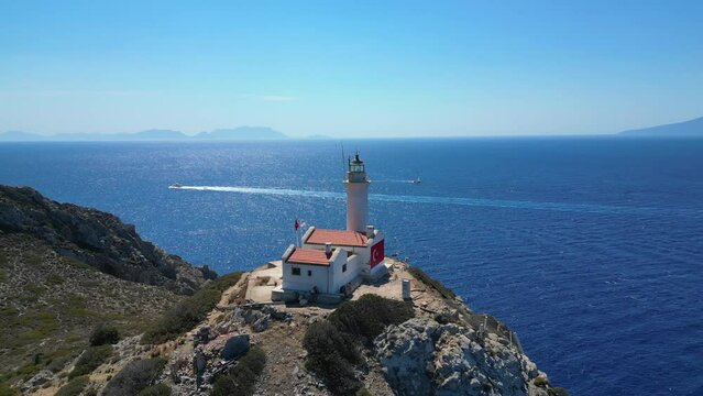Knidos lighthouse on the cliff at Datca peninsula in Turkey. Beautiful mediterranean seascape with a lighthouse on rocks.