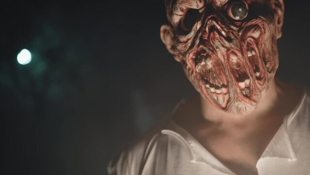 Scary halloween monster walks in the night 