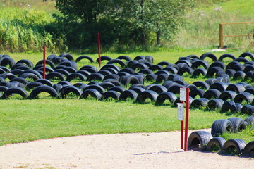 Tires dug into the ground, a tire maze
