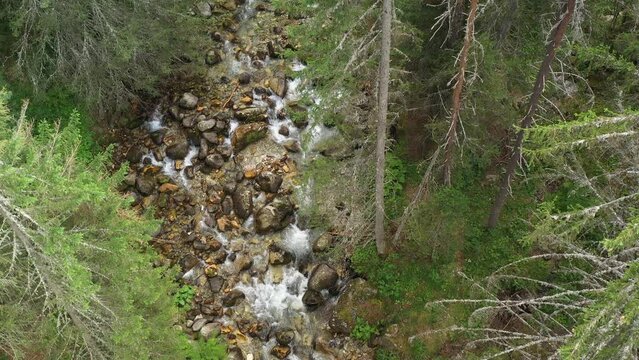 Aerial tilt up footage over Demianitsa river in Pirin mountain in Bulgaira, Europe. HQ 4K Apple RoRes aerial video.