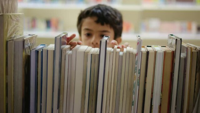 In a quiet, public library, a young child's insatiable curiosity leads to an enchanting exploration among bookshelves, creating a magical moment of literary wonder.