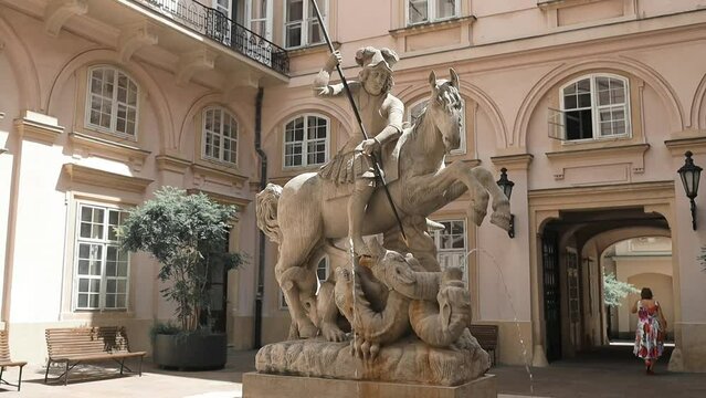 Fountain of St. George and the Dragon. Statue of St George killing a dragon in Bratislava. High quality FullHD footage