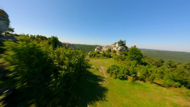Amazing green highlands of limestone rocks by FPV drone.