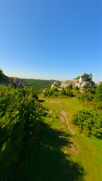 Amazing green highlands of limestone rocks by FPV drone.