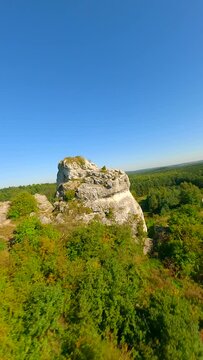 Amazing green highlands of limestone rocks by FPV drone.