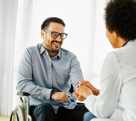 disability wheelchair doctor patient hospital medical disabled man handicap nurse handicapped...