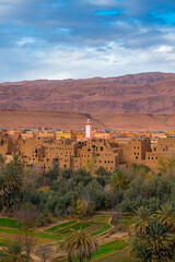 Fototapeta na wymiar View of the Kasbah of Tinghir and the Atlas Mountains in Morocco, at sunset, North Africa