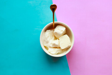 vanilla ice cream in white bowl top view