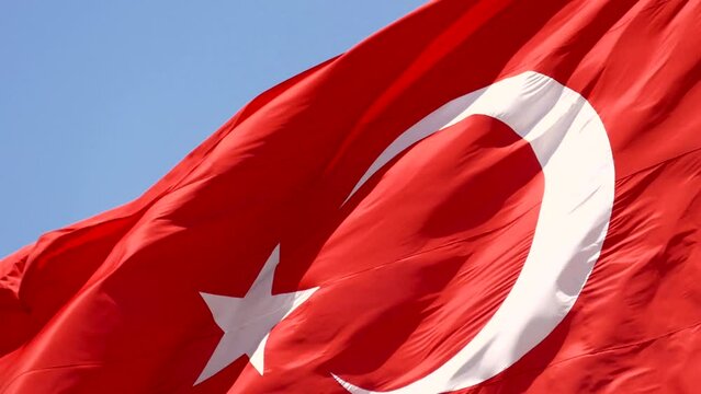flag of the republic of turkey, turkish flag waving in the wind, blue sky and the flag of the republic of turkey,