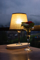 Cozy warm light of the cordless table lamp in the restaurant