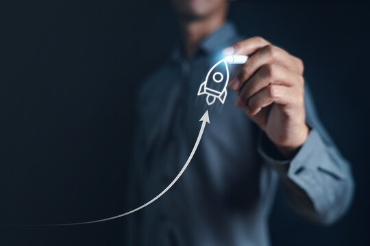 plan, document, report, goal, progress, rocket, target, investment, management, solution. close up to hand to drawing line growth of plan and progress via pen. then last point has rocket to fly up.