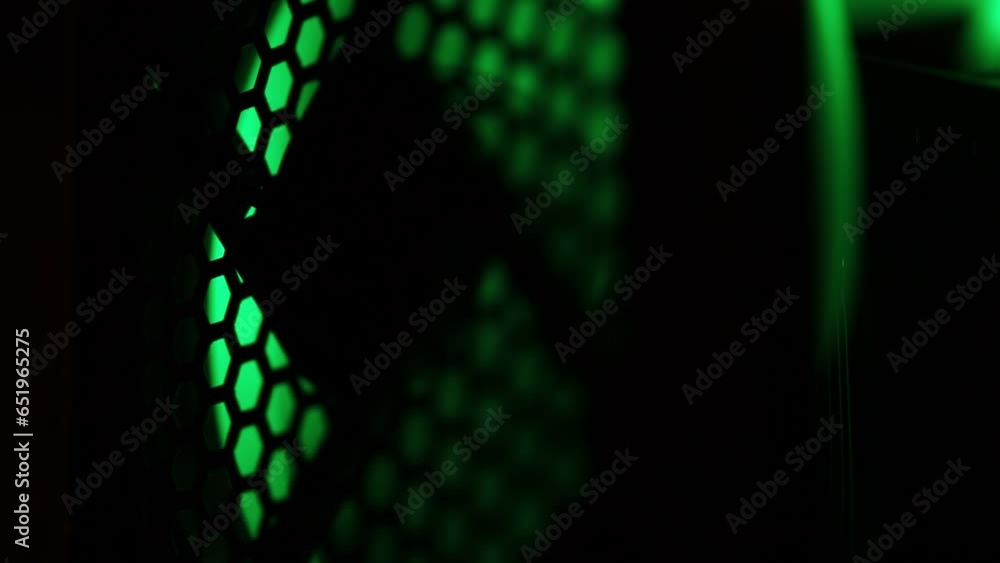 Poster Cooling fans in a computer with LED backlight.