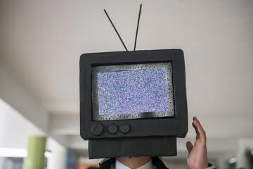 Man with TV smiling face instead of head