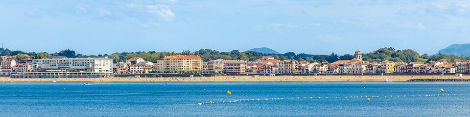 Saint-Jean-de-Luz and its Grande Plage beach on a sunny day in France