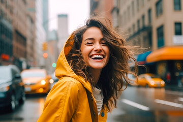 Portrait of a smiling happy woman in rainy New York, walking down the sidewalk, wearing fashionable...