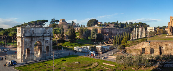 Panoramic view of hill Palatin with the triumphal arch of Constantine in the foreground, Rome, Italy