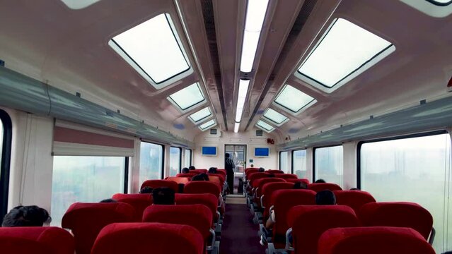 Pune to Hyderabad - intercity traveling by express train in India. Interior of a vistadome train.