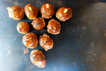 Close-up of mini burgers with a wooden toothpick ready for a party snack. Top view