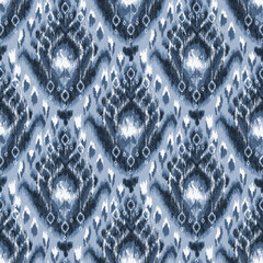 Ethnic ikat chevron pattern background Traditional pattern on the fabric in Indonesia and other Asian countries.