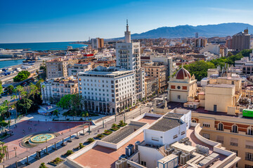 Malaga, Spain - April 14, 2023: Aerial view of Malaga skyline on a sunny day