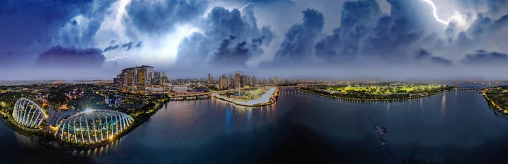 Fototapeten Singapore skyline with thunderstorm aprroaching © jovannig