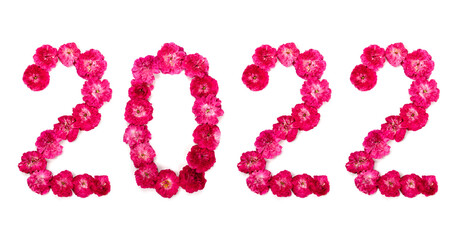 Inscription 2022 from fresh pink and red rose flowers. Happy New Year.	