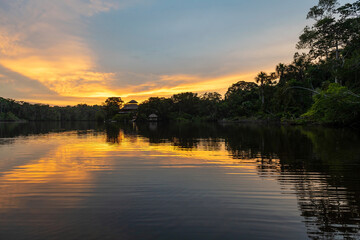 Amazon River Rainforest sunset reflection, Yasuni national park, Ecuador.