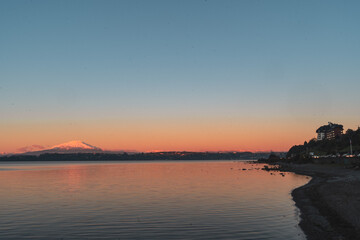 Fototapeta na wymiar long exposure sunset over the lake at puerto varas in chile