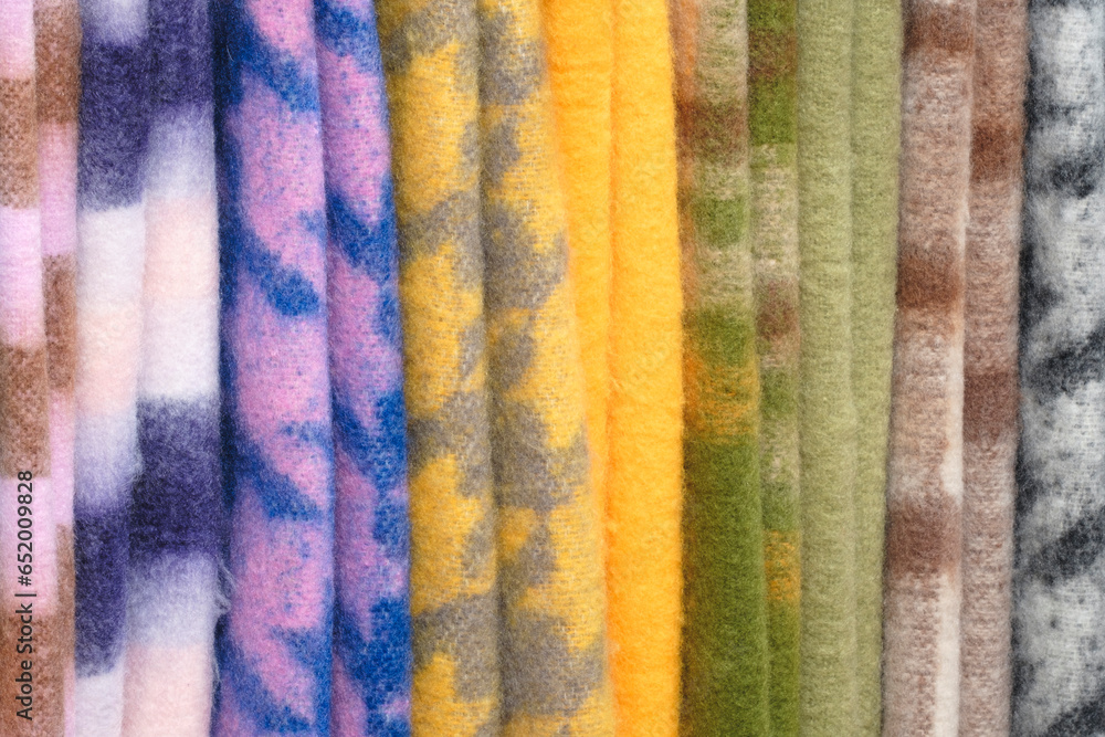 Aufkleber mix colorful hanging vertical stripe textile, fabrics, cloths on the rack. texture of multicolored f