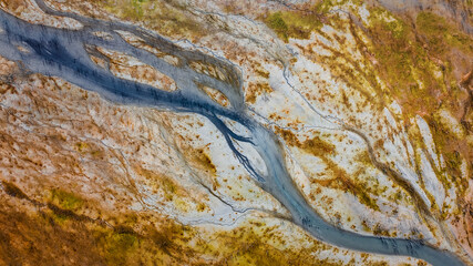 Aerial view of famous red mud disaster site,swamp,drought abstract lines,surreal landscape,Spanish feeling