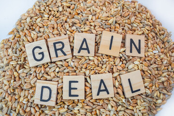 Wheat grains with letters Grain Deal isolated, Ukrainian grain crisis food insecurity