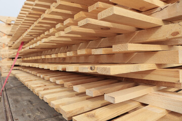 Close-up of variety of wooden pallets for transporting various goods and materials.Wooden pallets.