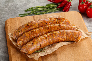 Raw sausages with spices and herbs
