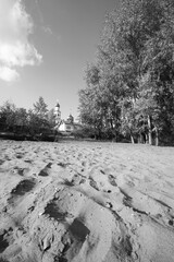 sandy slope near the church