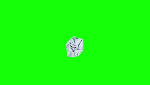 Loop stop motion of crumpling and unwrapping red piece of paper with white big letter m on green screen background. Isolated closeup footage of crumpling sticker with one of abc signs on alpha channel