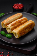 Delicious fresh homemade fried pancakes with broccoli and meat or fish