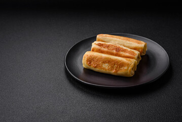 Delicious fresh homemade fried pancakes with broccoli and meat or fish