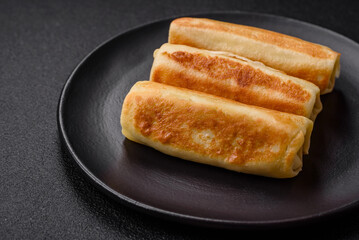 Delicious fresh homemade fried pancakes with broccoli and meat or fish