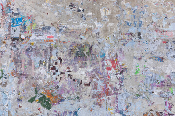 Colorful grunge concrete wall with layers of paint