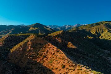 Picturesque landscape with mountain peaks at summer day