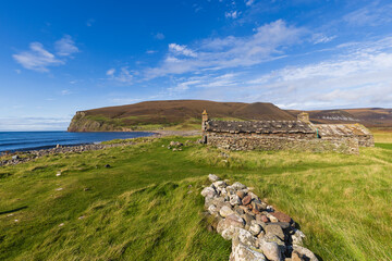 Old croft house, now used as a Bothy, in the Orkney Islands - obrazy, fototapety, plakaty