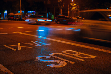 Cars on city road at night, blurred motion © chaossart