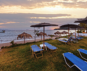 Sunrise view from beach. Summer coastline (Greece, Zakynthos, Alykes, Ionian Sea).