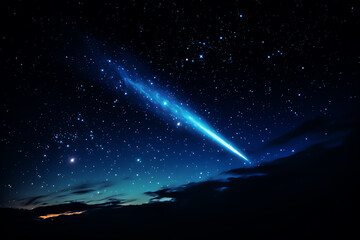 A vibrant blue comet illuminating the night sky