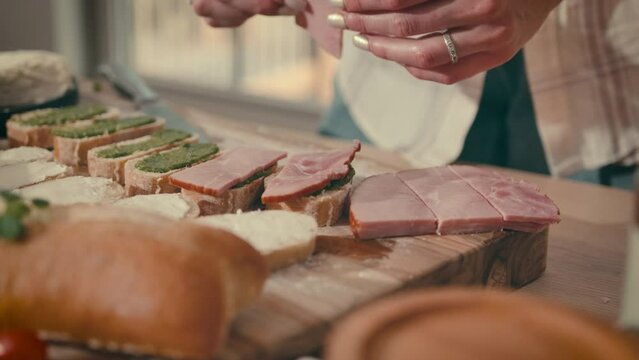 close-up of ham on bruschettes. holiday catering, holiday hors d'oeuvres. High quality 4k footage